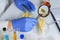 Expert hands inspecting cheese with magnifying glass in quality control laboratory