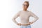 Explain yourself. Portrait of moody disappointed cute young woman in glasses cropped sweater raising head picky and