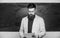 Explaining theory. College and high school. Prepare for test. Teacher bearded man hold documents chalkboard background