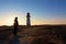 Explorer and a backlit lighthouse