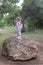 Explorer little girl forest park searching