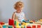 Exploring colorful educational activities. Infants\\\' joyful learning experiences. Child\\\'s imaginative playtime.