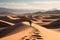 Exploring Death Valley man walking on Mesquite Flat Sand Dunes
