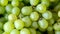 Exploring the Intricate Texture and Background of Green Kishmish Grapes: A Close-up Insight in AR 16