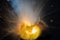 The explosion of an apple and lemon on a black background, breaking up, exploding