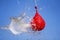 Explosion of balloon full of water