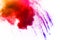 The explosion of colorful holi powder. The cloud of glowing color powder on white background