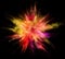 Explosion of coloured powder isolated on black background.