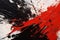 Explosive Chaos: Abstract Aggressive Brushstrokes in Black and Red