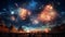 Explosive fireworks display illuminated by vibrant colors in the night sky