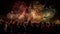 Explosive fireworks light up night sky, crowd cheers generated by AI