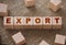 Export Word on Wood Cubes on a burlap. Trade reselling business concept