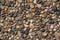 Exposed aggregate stone patio surface texture background