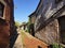 Exposed brickwork on buildings on a quiet street