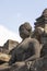 Exposed Buddha, reaching Nirvana, on top of the Borobudur temple