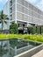 Exposed Concrete Roster Facade for this Hotel Building with pond