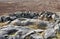 exposed stones at the top of a cairn known as the millers grave on midgley moor in calderdale west yorkshire