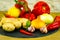 Exposition close up of fresh organic vegetables, composition with assorted raw organic vegetables, red pepper, onion and garlic, g