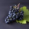 Exposition of fresh natural fruits, healthy food with many vitamin, watermelon, apple, grapes, pears on black background.