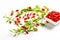 Exposition of fresh organic goji fruits, healthy food on white background.