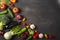 Exposition of fresh organic vegetables on wooden table. tomato, pepper, broccoli, onion, garlic, cucumber,  eggplant, black Eyed P