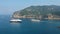 Express Skiathos Ferry boat from Hellenic Seaways crossing by Proteus Ferry boat from Anes lines outside the port of Skopelos