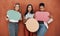 Express yourself no matter what. Cropped portrait of a young group of businesswomen standing together and holding speech