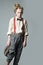 Expressing myself with fashion. jazz step fashion. teen girl in retro male suit. vintage english style. suspender and