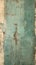 Expressionism: A Closeup of a Blue Door with Peeling Paint and E