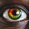 Expressive Close-Up Capturing an African American Man\\\'s Eye, Featuring Red, Yellow, and Green Iris