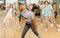Expressive teen girl dancing krump in choreographic studio