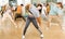 Expressive teen girl dancing krump in choreographic studio