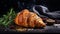 Exquisite Croissant With Herbs On Dark Background