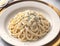 Exquisite Italian Carbonara Pasta Dish with Cheese and Tomato Sauce AI-Generated Food Photography