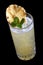 Exquisite original cocktail with pineapple. On dark background