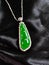 Exquisite pendant from sterling silver and an antique jade
