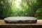 Exquisite Product Display: Stone Table amidst Lush Green Jungle