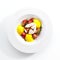 Exquisite serving burrata cheese with tomatoes and mango mousse top view