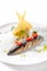 Exquisite serving grilled mackerel with mashed potatoes and tomatoes