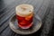 Exquisite traditional Spanish Carajillo drink, with coffee and liquor in a glass bowl