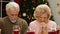 Extended family praying before Christmas meal, dinner blessing, holiday spirit