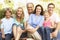 Extended Group Portrait Of Family In Garden