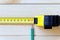 Extended measuring tape and a simple pencil