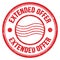 EXTENDED OFFER text written on red round postal stamp sign