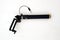 An extensible selfie stick with an adjustable clamp on the end on a white background