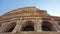 Exterior arch windows of Colosseum, UNESCO world heritage site, Rome, Italy.