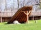 exterior of the archeopark, log construction with straw roofing, ancient Celtic buildings