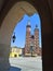 Exterior of the Basilica of Saint Mary, seen from Sukiennice Krakow Cloth Hall in the daytime.