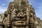 Exterior of the Bayon temple with gargantuan faces, Angkor Thom, Angkor, Cambodia