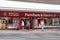 Exterior of British Heart Foundation Furniture and Electrical shop store showing sign, signage, logo and branding above top of ent